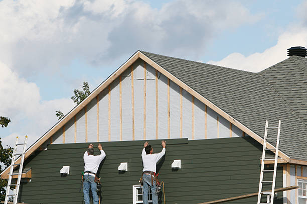 Professional Siding Installation technician working in Oak Hill, OH